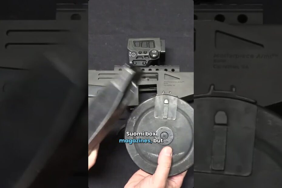 Inside the MPA-971 feeding system: Suomi drums, quad‑stack mags, and the rat‑tail release