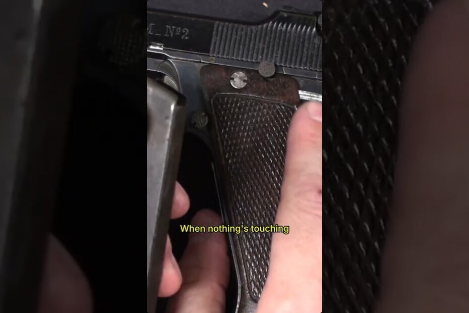 French prototype pistol with a built‑in round counter — how it works