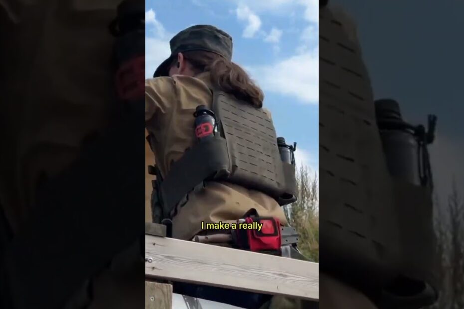 Shooting a live drone with one shotgun round while chained